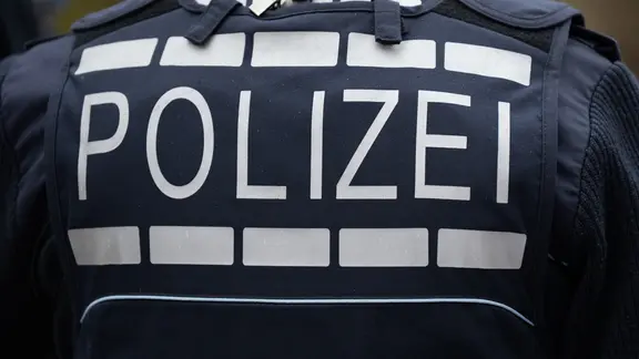 Polizei bei einer Durchsuchung